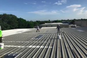 Commercial roofing crew on a flat commercial roof