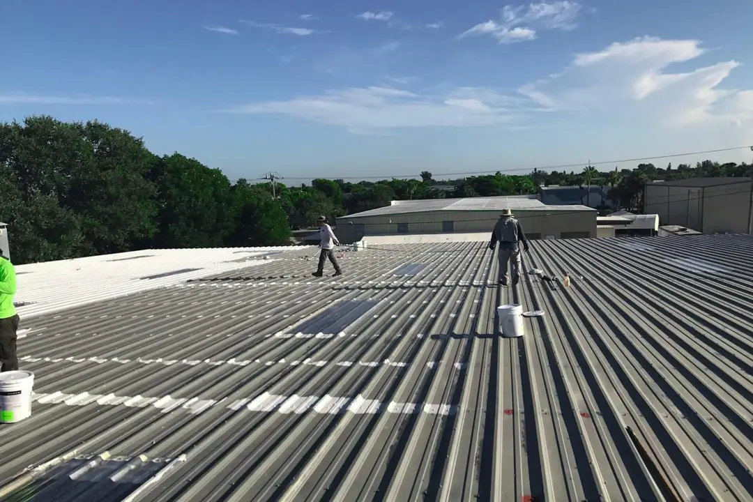 Commercial roofing crew on a flat commercial roof